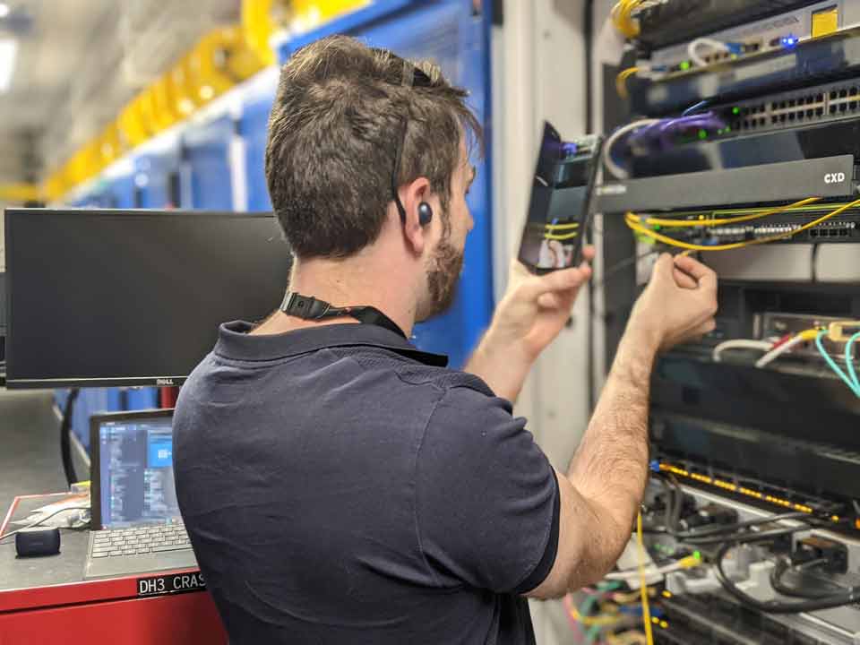 Matt Shearing, OneQode CEO in a data centre in Brisbane using TeamViewer Pilot App